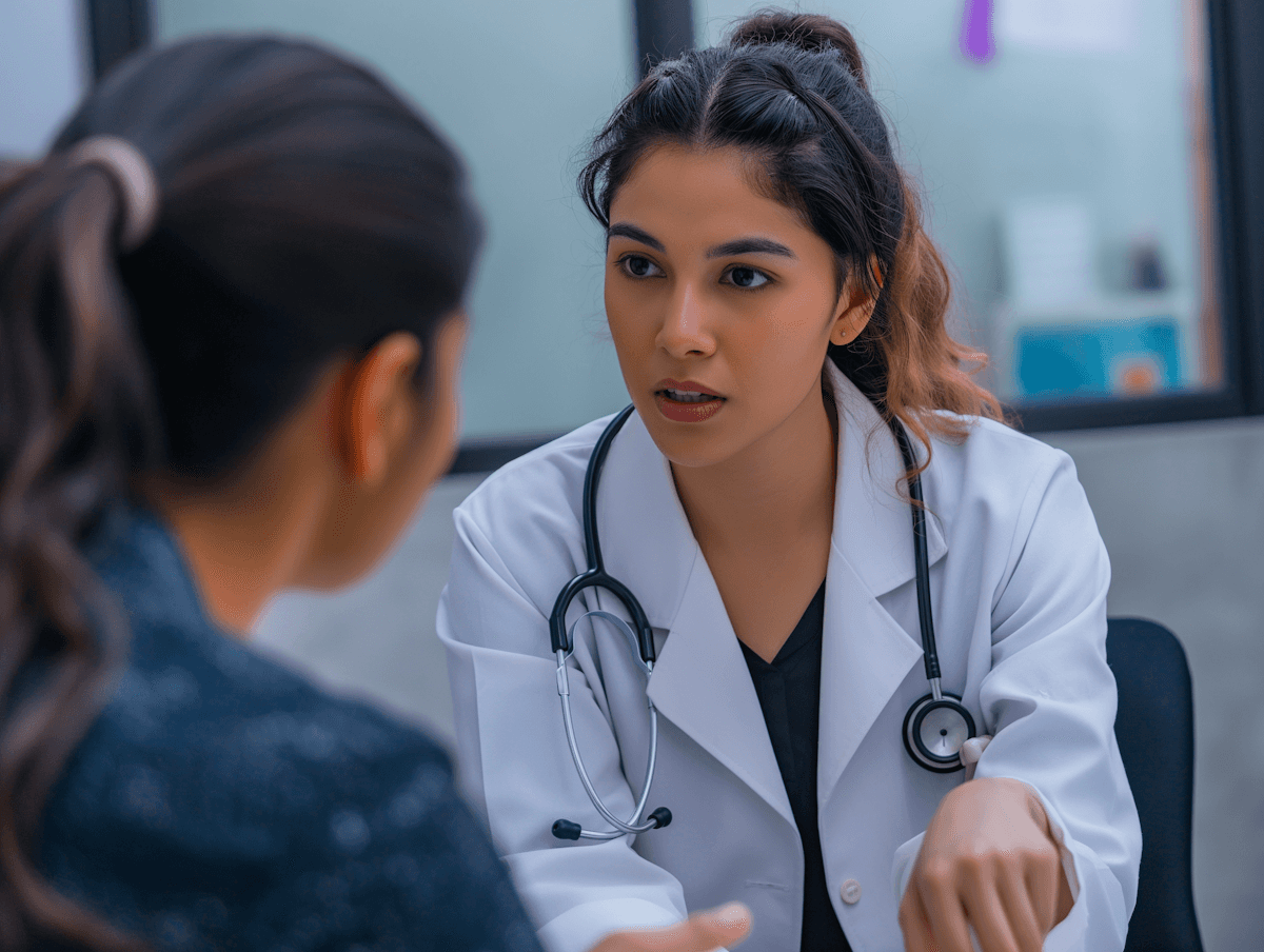 two women talking about treatment: we are a Trusted & Understanding skin care clinic